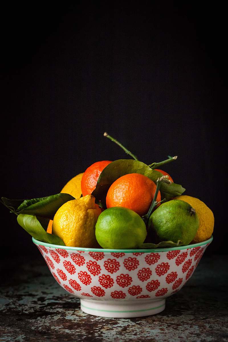 food orange and green fruits on bowl fruit
